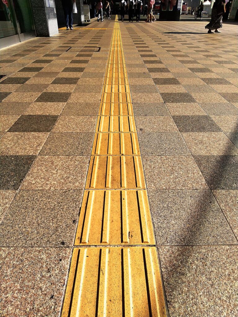 Japan accessible travel guide: tactile paving outside hakata station